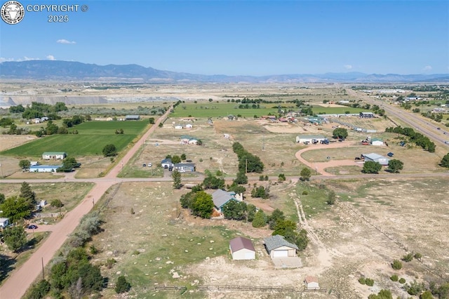 aerial view featuring a mountain view and a rural view