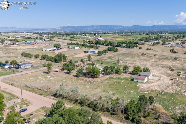 bird's eye view with a rural view and a mountain view