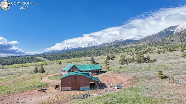 view of mountain feature with a rural view