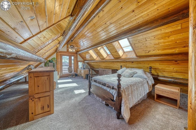 bedroom featuring carpet floors, lofted ceiling with skylight, and wooden ceiling