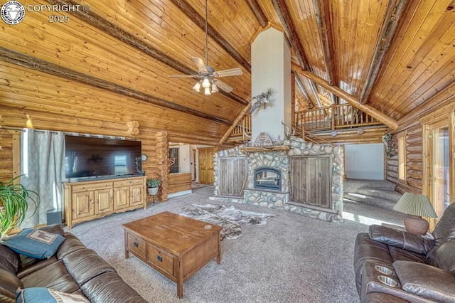 carpeted living area featuring beam ceiling, ceiling fan, rustic walls, and wooden ceiling