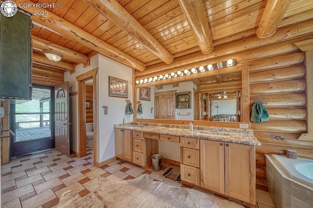 bathroom featuring toilet, double vanity, beam ceiling, and wood ceiling