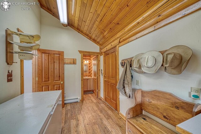 corridor featuring light wood-type flooring, wooden ceiling, a baseboard heating unit, and high vaulted ceiling