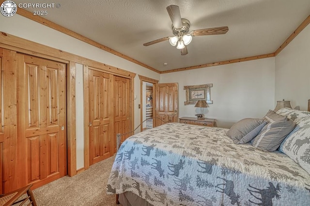 carpeted bedroom featuring a ceiling fan