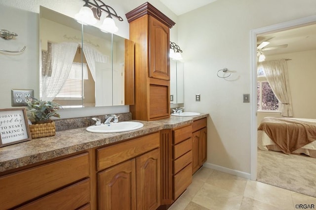 bathroom featuring vanity and ceiling fan