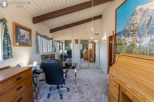 carpeted home office featuring vaulted ceiling with beams and wood ceiling