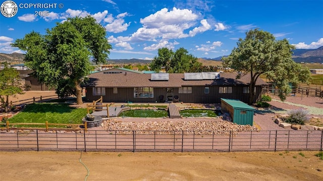 ranch-style house with a mountain view