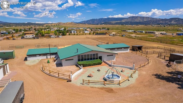 drone / aerial view featuring a mountain view