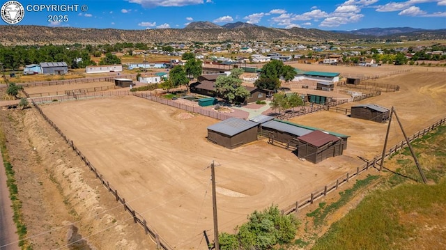 drone / aerial view featuring a mountain view