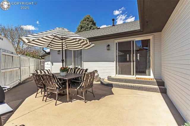 717 Tyrolean Way, Canon City, CO 81212 - view of patio / terrace with entry steps, fence, and outdoor dining area