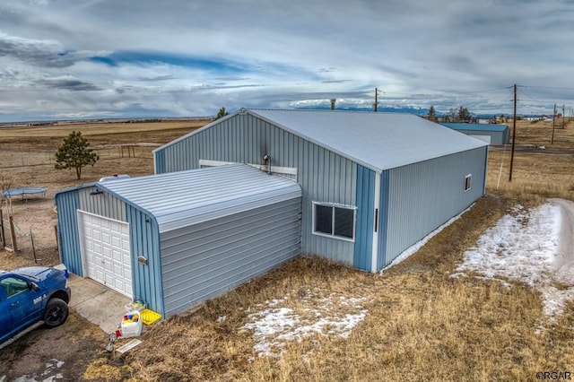 view of property exterior with a garage