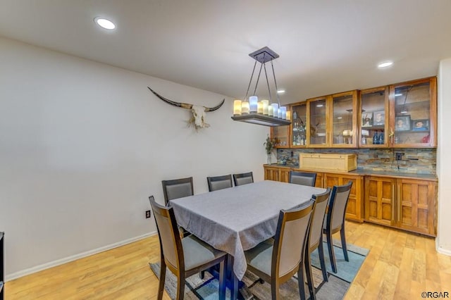 dining room featuring light hardwood / wood-style floors