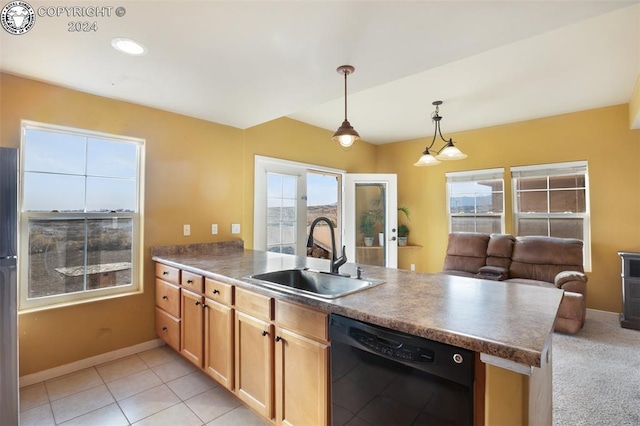 kitchen featuring dishwasher, sink, hanging light fixtures, light tile patterned floors, and kitchen peninsula