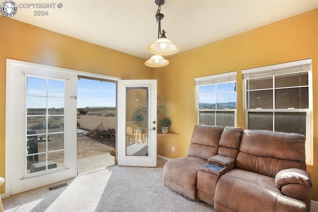 living room with french doors and carpet