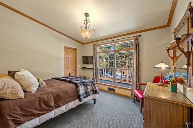 bedroom featuring crown molding, vaulted ceiling, and carpet flooring