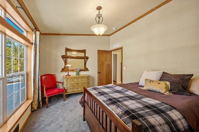 carpeted bedroom with ornamental molding