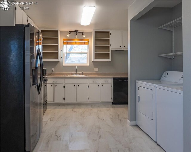 kitchen with sink, dishwasher, white cabinets, washing machine and clothes dryer, and stainless steel fridge with ice dispenser