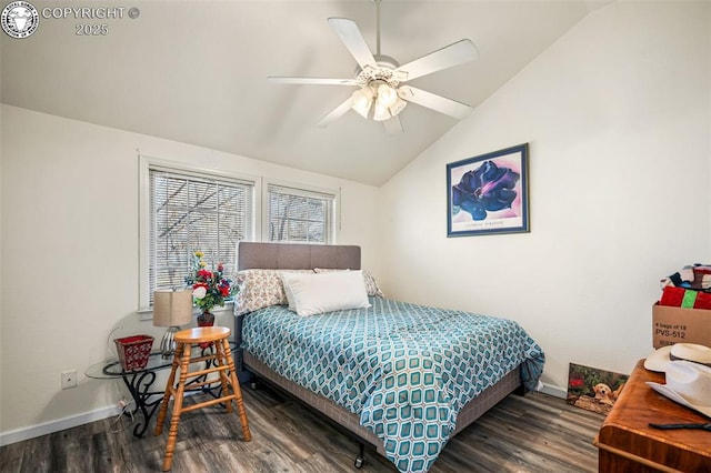 bedroom featuring dark wood-type flooring, ceiling fan, and lofted ceiling