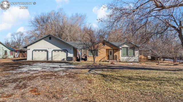 single story home with a garage