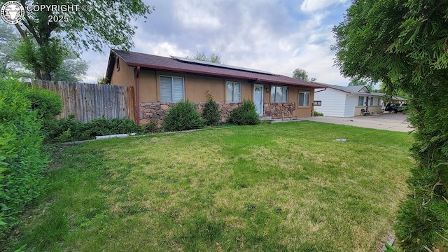 305 Meadowlark Cir, Florence, CO 81226 - single story home featuring solar panels, stone siding, and stucco siding