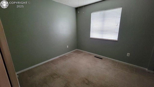 305 Meadowlark Cir, Florence, CO 81226 - carpeted empty room featuring baseboards