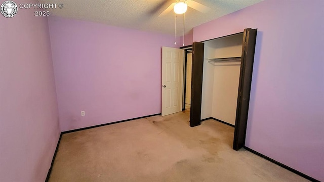 305 Meadowlark Cir, Florence, CO 81226 - unfurnished bedroom featuring light carpet, baseboards, a textured ceiling, and ceiling fan