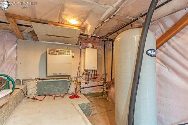 utility room featuring water heater