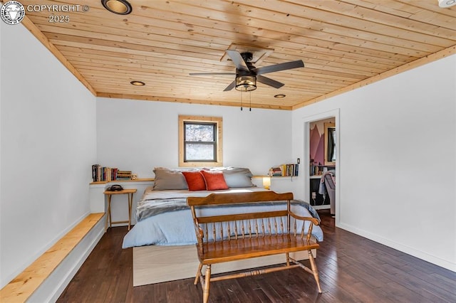 bedroom featuring wooden ceiling, baseboards, and hardwood / wood-style floors