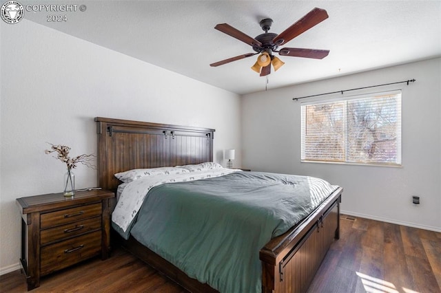 1002 Ussie Ave, Canon City, CO 81212 - bedroom featuring dark wood finished floors, baseboards, and ceiling fan