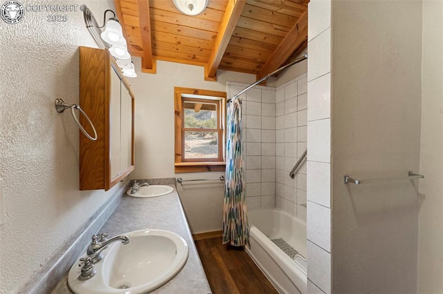 bathroom featuring hardwood / wood-style floors, shower / tub combo with curtain, lofted ceiling with beams, vanity, and wood ceiling