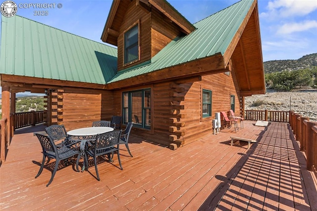 wooden terrace with a mountain view