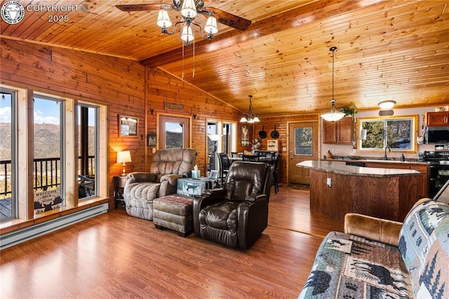 living room featuring hardwood / wood-style flooring, vaulted ceiling with beams, and wooden ceiling