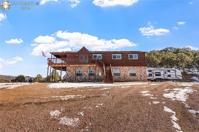 view of front of house featuring a deck