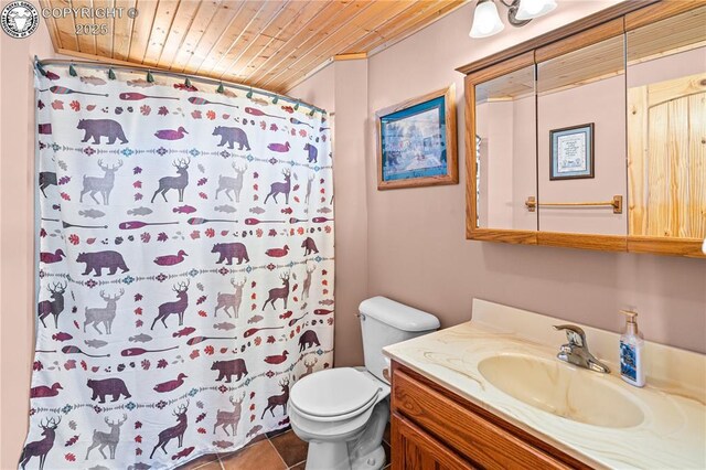 bathroom featuring curtained shower, vanity, toilet, wooden ceiling, and tile patterned floors