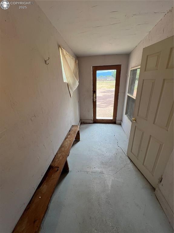 2428 Central Ave, Canon City, CO 81212 - doorway to outside featuring unfinished concrete floors