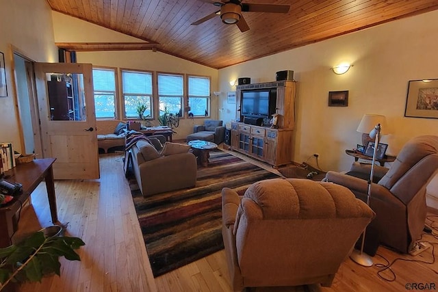 living room featuring ceiling fan, lofted ceiling, wood ceiling, and light wood-type flooring