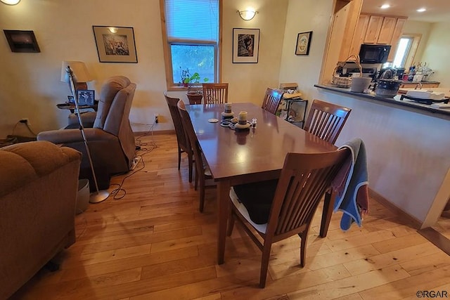 dining area featuring light hardwood / wood-style floors