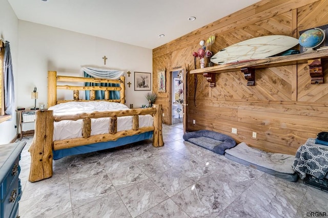 bedroom with wooden walls