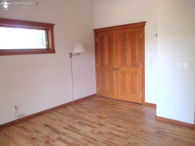 unfurnished bedroom with light hardwood / wood-style floors