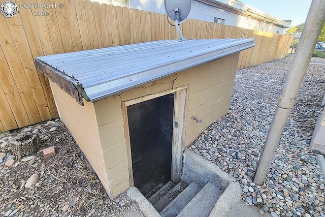 view of entry to storm shelter