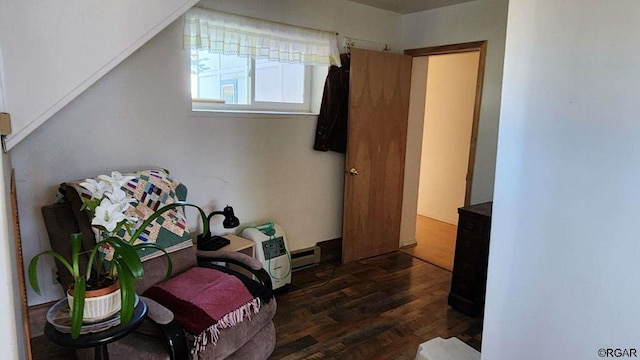 bedroom with dark hardwood / wood-style floors