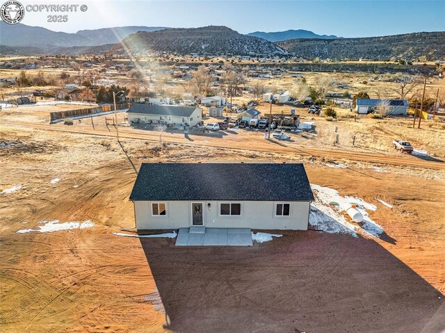 bird's eye view with a mountain view