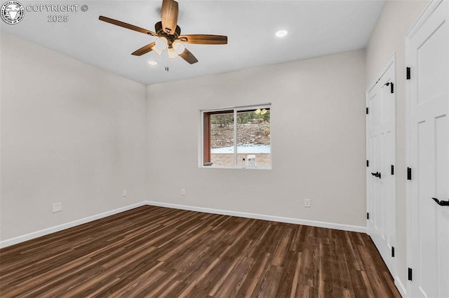 unfurnished bedroom with dark wood-style floors, recessed lighting, baseboards, and ceiling fan