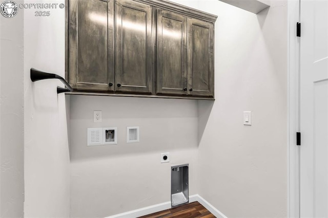 washroom with dark wood-style floors, cabinet space, baseboards, hookup for an electric dryer, and hookup for a washing machine