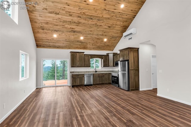 kitchen with high vaulted ceiling, dark wood-style floors, stainless steel appliances, light countertops, and dark brown cabinets