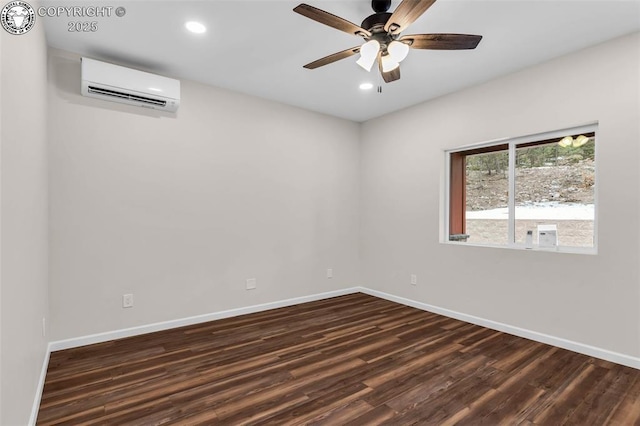 empty room featuring a ceiling fan, dark wood-style floors, baseboards, and a wall mounted AC