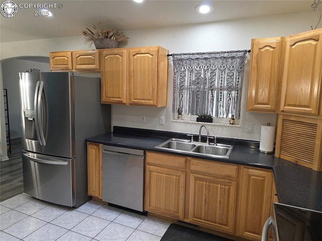 2823 River Run Ct, Canon City, CO 81212 - kitchen featuring stainless steel appliances, light tile patterned flooring, dark countertops, and recessed lighting