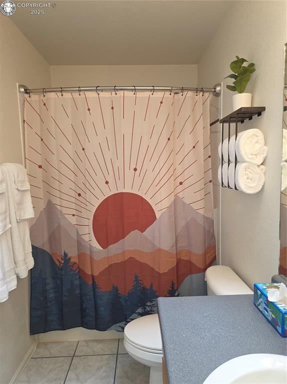 2823 River Run Ct, Canon City, CO 81212 - bathroom with vanity, a shower with curtain, and tile patterned floors
