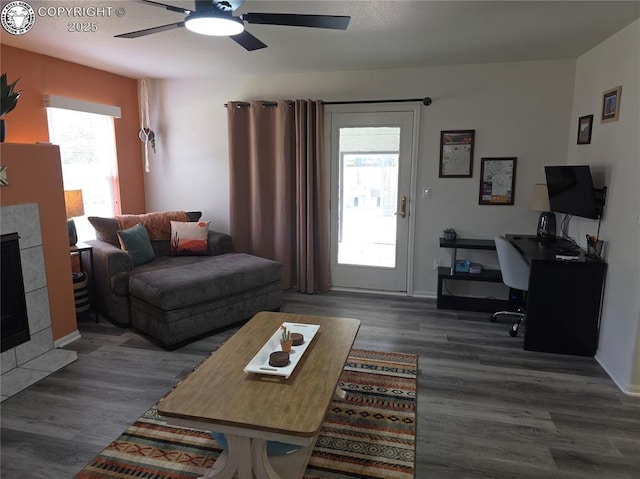 2823 River Run Ct, Canon City, CO 81212 - living room with a desk, wood finished floors, ceiling fan, and healthy amount of natural light