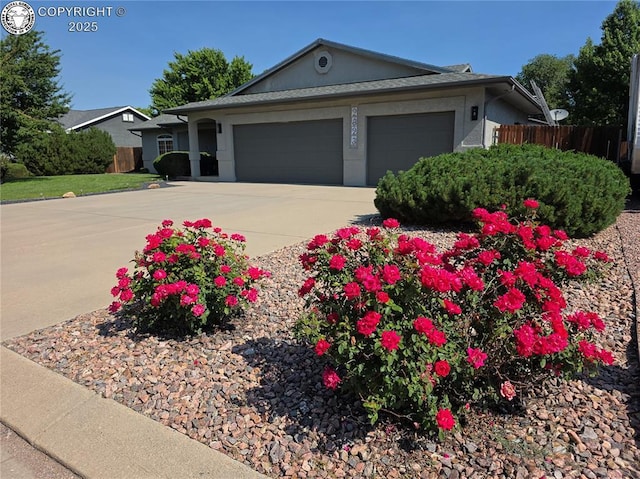 2823 River Run Ct, Canon City, CO 81212 - single story home with an attached garage, concrete driveway, and stucco siding